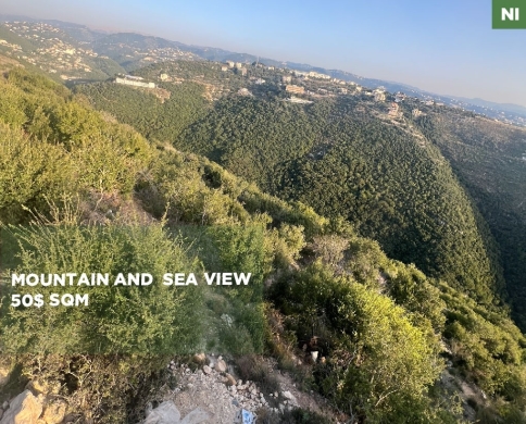 Investment Land/flat terrain/sea views/access to main road/Gharzouz, Jbeil/غرزوز/REF#NI142235