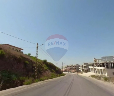 R9-3722 Land for Sale in Bireh – Akkar, 9500 m², Planted with Kina Treesأرض للبيع في بيره عكار – 9500 م²، مزروعة بأشجار كينا