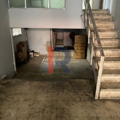 R9-1663 A strategically located property for sale in Zahriyeh, Tripoli, featuring a 142 sqm apartment and a 104 sqm shop with mezzanine.